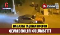 Bagajda taşınan koltuk çevredekileri gülümsetti