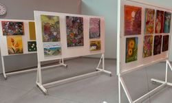 Berna Kelebek’in “Kelebek Esintileri” resim sergisi Ercan Havalimanı’da açıldı