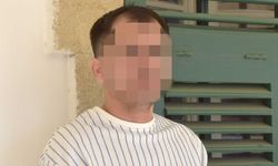 Telefonla ölüm tehdidi, ardından eşini darp etti