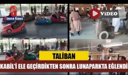 Taliban Kabil'i ele geçirdikten sonra lunaparkta eğlendi