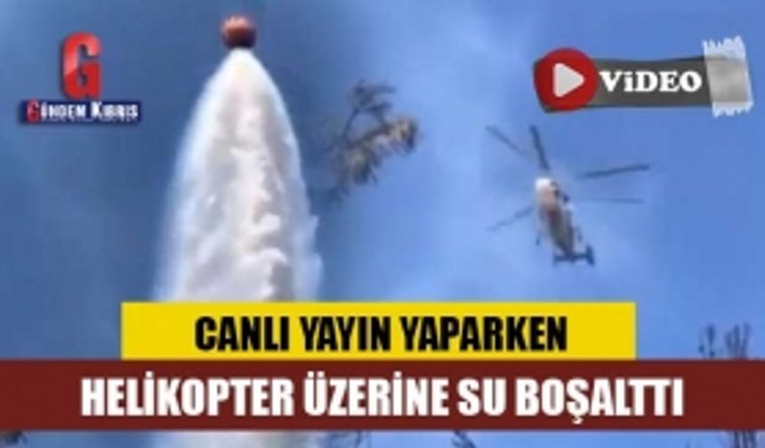 Canlı yayın yaparken helikopter üzerine su boşalttı