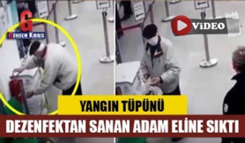 Yangın tüpünü dezenfektan sanan adam eline sıktı